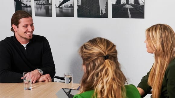 Three people with each other in a job interview
